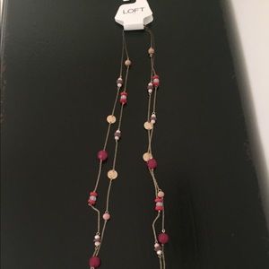 Lift long multi strand necklace